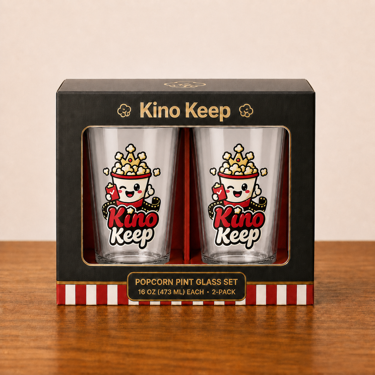 Two clear pint glasses with the new Pop Pop artwork in premium black-and-gold retail packaging